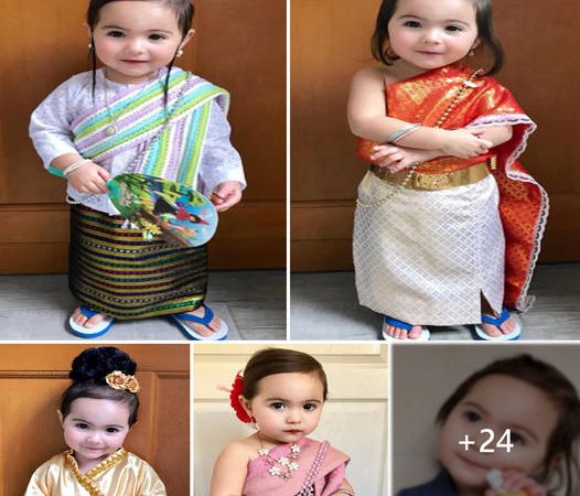 Enchanting Every Gaze: The Beauty of 2-Year-Old Eurasian Girl in Traditional Costume