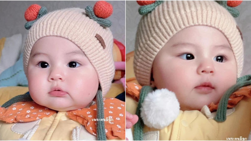 Sweet Bliss: The Unforgettable Moment as a Little Girl Indulges in Cake with Rosy Blush Cheeks