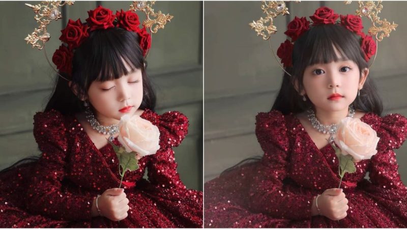 Captivating Elegance: A Mesmerizing Portrait of a Stunning Young Lady in a Crimson Princess Attire.