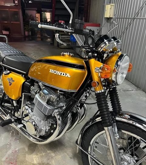 The 1969 Honda CB 750 four motorcycle! was the first motorcycle to be called a superbike.( in lovely candy Gold color)